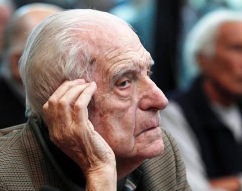 Argentina's former President and Army Chief Reynaldo Bignone sits in a courthouse during the first day of his trial, accused of participating in "Operation Condor", in Buenos Aires, March 5, 2013. PHOTO BY REUTERS/Enrique Marcarian