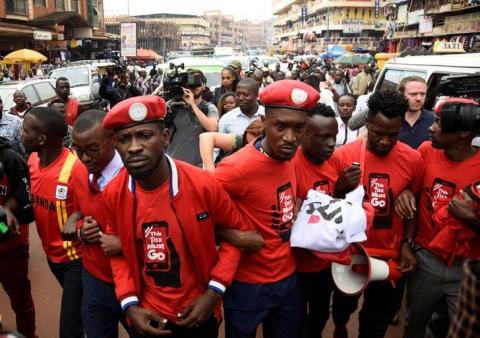 Ugandan musician turned politician, Robert Kyagulanyi (C) leads activists during a demonstration against new taxes including a levy on access to social media platforms in Kampala, Uganda, July 11, 2018. PHOTO BY REUTERS/Newton Nambwaya