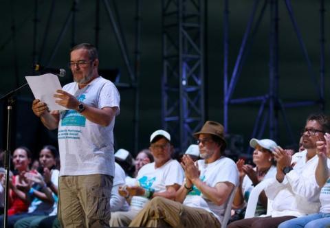 FARC rebel leader Rodrigo Londono, better known by his nom de guerre Timochenko receives applause during the closing ceremony of a rebel congress near El Diamante in Yari Plains, Colombia, September 23, 2016. PHOTO BY REUTERS/John Vizcaino