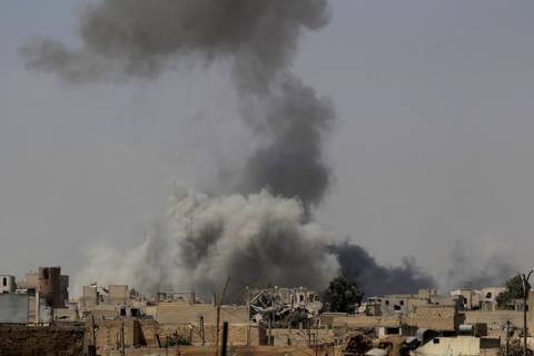 Smoke rises after an air strike during fighting between members of the Syrian Democratic Forces and Islamic State militants in Raqqa, Syria, August 20, 2017. PHOTO BY REUTERS/Zohra Bensemra