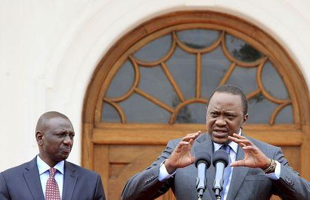 Kenya's President Uhuru Kenyatta (R) addresses a news conference next to his deputy William Ruto at State House in Nairobi July 21, 2015 to provide an update on U.S. President Barack Obama's scheduled visit. PHOTO BY REUTERS/Noor Khamis
