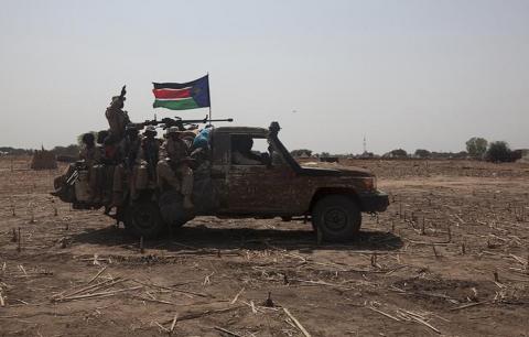 SPLA soldiers drive to the frontline at Mathiang from their military base in Bor, South Sudan, January 26, 2014. PHOTO BY REUTERS/George Philipas