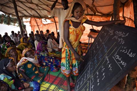 Children attend a makeshift school at Gassire, a camp for displaced Chadians who have fled fighting around the eastern town of Gos Beida near the Sudanese border, June 7, 2008. Reflecting the violence in Darfur that has swept in both directions across the Chad-Sudan border, there are 250,000 Sudanese refugees scattered in a dozen camps in eastern Chad and 180,000 internally displaced Chadians, U.N. officials say. PHOTO BY REUTERS/Finbarr O'Reilly