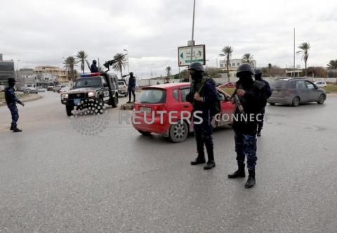 Central security support force carry weapons during the security deployment in the Tajura neighborhood, east of Tripoli, Libya, January 14, 2020. PHOTO BY REUTERS/Ismail Zitouny