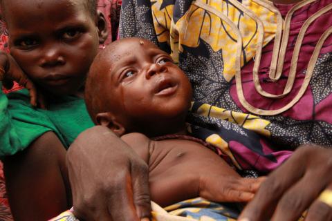 Shetene, who is one among many children who are in a poor state of health, is carried by his mother in the GSSS camp in Bama, in Borno state, Nigeria, August 15, 2018. PHOTO BY REUTERS/Nitin George/Medecins Sans Frontieres (MSF)