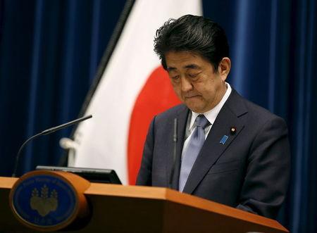 Japan's Prime Minister Shinzo Abe attends a news conference to deliver a statement marking the 70th anniversary of World War Two's end, at his official residence in Tokyo, August 14, 2015. PHOTO BY REUTERS/Toru Hanai