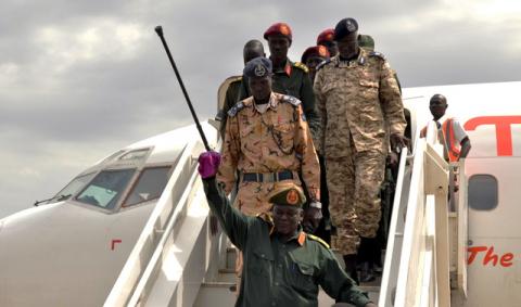 General Simon Gatwech Dual, the chief of staff of the rebel troops of the Sudan People's Liberation Army in Opposition (SPLA-IO), waves to supporters as he arrives at the Juba International Airport in South Sudan's capital Juba, April 25, 2016. PHOTO BY REUTERS/Jok Solomun
