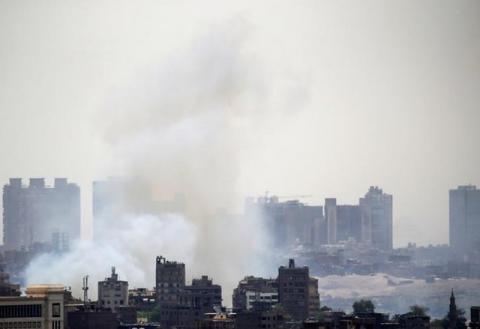 Smoke rises over the sky in the capital of Cairo, Egypt, June 8, 2017. PHOTO BY REUTERS/Amr Abdallah Dalsh
