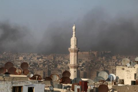 A general view shows rising smoke from burning tyres, which activists said are used to create smoke cover from warplanes, in Aleppo, Syria, August 1, 2016. PHOTO BY REUTERS/Abdalrhman Ismail