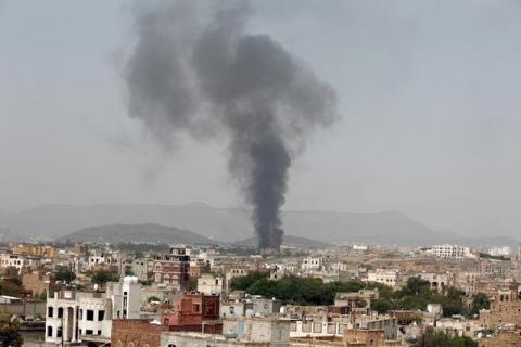 Smoke rises from a snack food factory after a Saudi-led air strike hit it in Sanaa, Yemen, August 9, 2016. PHOTO BY REUTERS/Khaled Abdullah