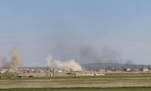 Smoke rises around the Syrian southern town of Bosra al-Sham, March 24, 2015. PHOTO BY REUTERS/Wsam Almokdad