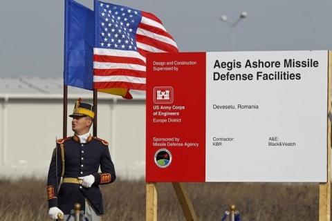 A Romanian soldier attends the official ground breaking ceremony of the site for the U.S. Aegis Ashore missile defense facility, located in a former airbase on Deveselu that will form part of a shield to protect Europe, next to Deveselu village, 182 km east of Bucharest, October 28, 2013. PHOTO BY REUTERS/Bogdan Cristel