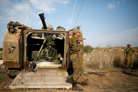 GAZA/JERUSALEM (Reuters) - Palestinian militant groups in Gaza said on Tuesday they would halt cross-border attacks immediately if Israel did the same after the most serious exchanges of aerial fire since a seven-week war in 2014.  An Israeli official, speaking on condition of anonymity, responded by putting the onus on the Palestinians to stop their strikes, saying Israel's actions would be determined by their "steps on the ground".  Since Monday, Israeli air strikes have killed seven Palestinians, at leas