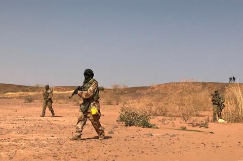 Nigerien commandos simulate a raid on a militant camp during the U.S. sponsored Flintlock exercises in Ouallam, Niger. PHOTO BY REUTERS/Aaron Ross