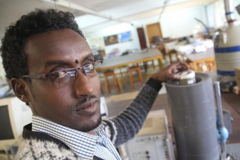 Nuclear physics doctoral student, Hailu Geremew, poses for a picture in the Addis Ababa University nuclear physics laboratory on January 21, 2019. PHOTO BY Thomson Reuters Foundation/Sebastien Malo