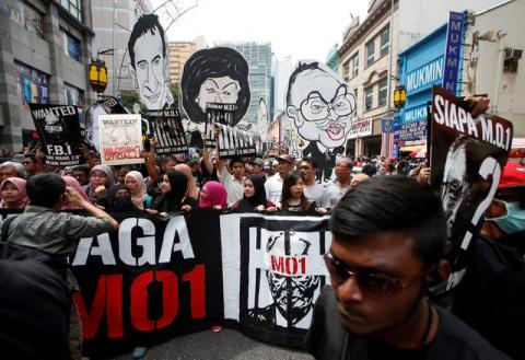 Student activists march towards Dataran Merdeka, or Independence Square, to call for the arrest of "Malaysian Official 1" in Kuala Lumpur, Malaysia, August 27, 2016. PHOTO BY REUTERS/Edgar Su
