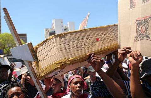 Students protest outside the parliament ahead of South African Finance Minister Pravin Gordhan's medium term budget speech in Cape Town, South Africa, October 26, 2016. PHOTO BY REUTERS/Sumaya Hisham