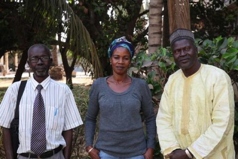 Survivors of Yahya Jammeh's AIDS treatment programme Lamin Ceesay, Fatou Jatta and Ousman Sowe (left to right) pose for a photo in Banjul, Gambia, January 18, 2018. PHOTO by Thomson Reuters Foundation/Nellie Peyton