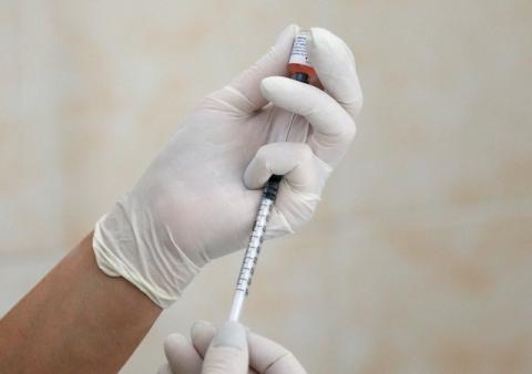 A nurse fills a syringe with a vaccine before administering an injection at a children's clinic in Kiev, Ukraine, August 14, 2019. PHOTO BY REUTERS/Valentyn Ogirenko