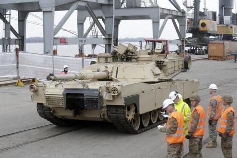 An Abrams main battle tank, for U.S. troops deployed in the Baltics as part of NATO's Operation Atlantic Resolve, leaves Riga port, March 9, 2015. PHOTO BY REUTERS/Ints Kalnins