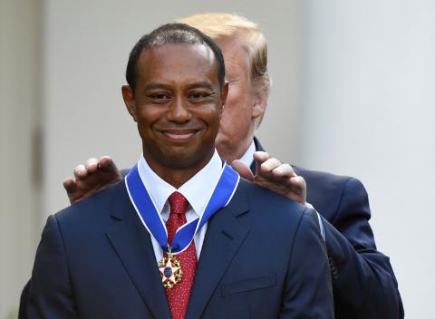 Golfer Tiger Woods is awarded the Presidential Medal of Freedom, the nation's highest civilian honor, by U.S. President Donald Trump in the Rose Garden at the White House in Washington, U.S., May 6, 2019. PHOTO BY REUTERS/Clodagh Kilcoyne