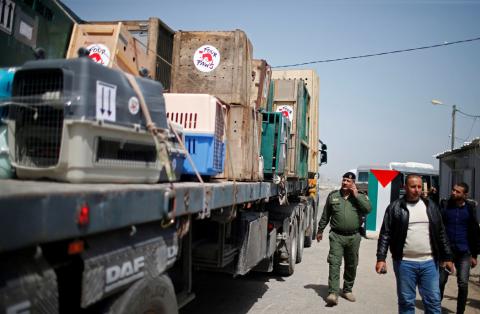 A truck carrying crates containing animals leaves Gaza after the animals were taken out of a Gaza zoo by FOUR PAWS organization, at Israeli Erez crossing in the northern Gaza Strip, April 7, 2019. PHOTO BY REUTERS/Mohammed Salem