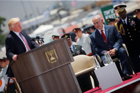 Israel's Prime Minister Benjamin Netanyahu (R) listens as U.S. President Donald Trump (L) speaks during a welcoming ceremony upon his arrival at Ben Gurion International Airport in Lod near Tel Aviv, Israel, May 22, 2017. PHOTO BY REUTERS/Jonathan Ernst