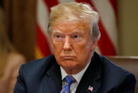 U.S. President Donald Trump listens during a cabinet meeting at the White House in Washington, U.S., July 18, 2018. PHOTO BY REUTERS/Leah Millis