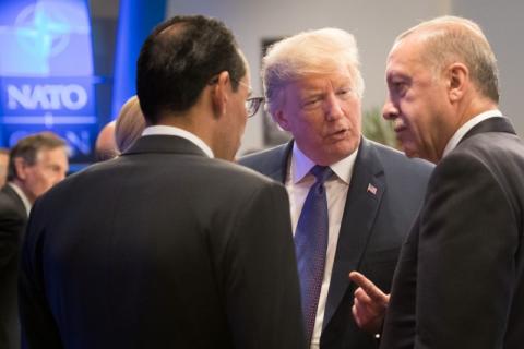 U.S. President Donald Trump and President of Turkey Recep Tayyip Erdogan attend a dinner at the Art and History Museum at the Parc du Cinquantenaire during the NATO Summit in Brussels, Belgium, July 11, 2018. PHOTO BY REUTERS/Benoit Doppagne