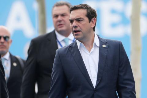 Greek Prime Minister Alexis Tsipras arrives for the second day of a NATO summit in Brussels, Belgium, July 12, 2018. PHOTO BY REUTERS/Tatyana Zenkovich
