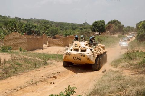 United Nations peacekeeping force vehicles drive by houses destroyed by violence in September, in the abandoned village of Yade, Central African Republic, April 27, 2017. PHOTO BY REUTERS/Baz Ratner