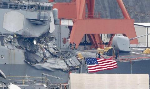 The Arleigh Burke-class guided-missile destroyer USS Fitzgerald, damaged by colliding with a Philippine-flagged merchant vessel, is seen at the U.S. naval base in Yokosuka, Japan, June 18, 2017. PHOTO BY REUTERS/Kyodo