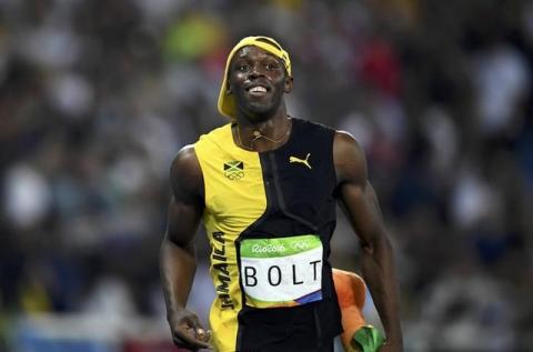 Usain Bolt (JAM) of Jamaica celebrates after winning the race in Rio de Janeiro, Brazil, August, 2016. PHOTO BY REUTERS/Dylan Martinez