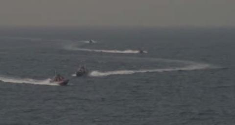 Footage taken aboard the USS Nitze shows of Islamic Revolutionary Guard vessels. PHOTO BY REUTERS TV