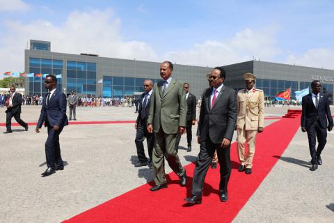Eritrea's President Isaias Afwerki (L) is welcomed by Somalia's President Mohamed Abdullahi Mohamed as he arrives at the Aden Abdulle International Airport in Mogadishu, Somalia, December 13, 2018. PHOTO BY REUTERS/Feisal Omar