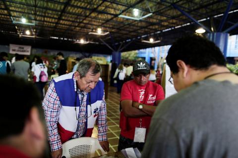 Electoral observers of the Nationalist Republican Alliance (ARENA) and of the Farabundo Marti National Liberation Front (FMLN) political parties monitor at a polling station during the presidential election in San Salvador, El Salvador, February 3, 2019. PHOTO BY REUTERS/Carlos Barrera