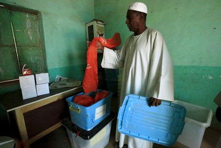 A voting officer prepares a school to be used as a voting centre ahead of the 2015 elections in Khartoum, April 12, 2015. PHOTO BY REUTERS/Mohamed Nureldin Abdallah