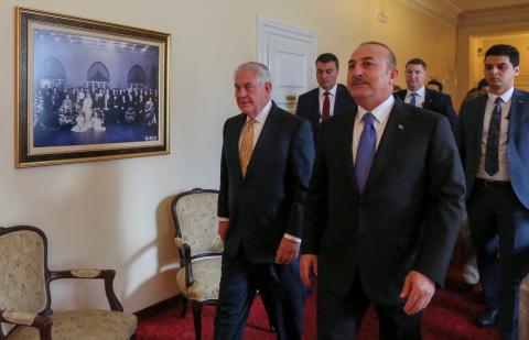 Turkish Foreign Minister Mevlut Cavusoglu and U.S. Secretary of State Rex Tillerson arrive to a meeting in Ankara, Turkey, February 16, 2018. PHOTO BY REUTERS/Cem Ozdel