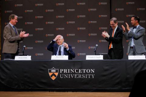 Canadian-American scientist James Peebles (C) is greeted as he speaks to attendees after he won the 2019 Nobel Prize for Physics along with Michel Mayor and Didier Queloz, at Princeton University, New Jersey, U.S., October 8, 2019. PHOTO BY REUTERS/Eduardo Munoz