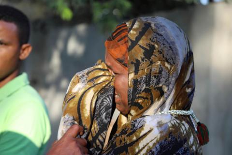 A Somali woman mourns at the scene of a suicide car bomb explosion, at the gate of Naso Hablod Two Hotel in Hamarweyne district of Mogadishu, Somalia, October 29, 2017. PHOTO BY REUTERS/Feisal Omar
