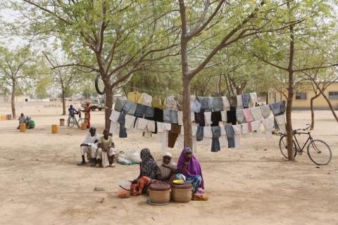 Women sell food in Kerawa, Cameroon, March 16, 2016. Kerawa is on the border with Nigeria and is subject to frequent Boko Haram attacks. PHOTO BY REUTERS/Joe Penney
