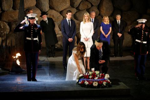 U.S. President Donald Trump and first lady Melania lay a wreath during a ceremony commemorating the six million Jews killed by the Nazis in the Holocaust, in the Hall of Remembrance at Yad Vashem Holocaust memorial in Jerusalem, May 23, 2017. PHOTO BY REUTERS/Jonathan Ernst