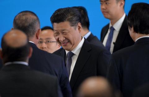 Chinese President Xi Jinping shakes hands with guests after delivering a speech at the opening ceremony of the fifth regular foreign ministers' meeting of the Conference on Interaction and Confidence Building Measures in Asia (CICA) at the Diaoyutai State Guesthouse in Beijing, April 28, 2016. PHOTO BY REUTERS/Kenzaburo Fukuhara