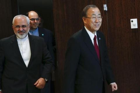 United Nations Secretary General Ban Ki-moon (R) arrives to a meeting with Iranian Foreign Minister Mohammad Javad Zarif at U.N. headquarters in New York, September 18, 2014. PHOTO BY REUTERS/Shannon Stapleton