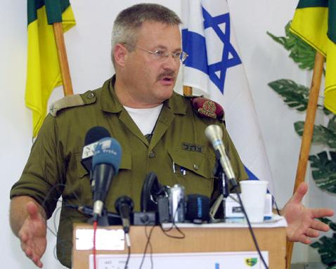 Brigadier-General Yisrael Ziv, commander of Israeli forces in Gaza, speaks at a news conference in Gaza, September 3, 2002. PHOTO BY REUTERS/Tsafrir Abayov