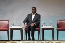 The new president of the African Development Bank (AfDB) Akinwumi Adesina of Nigeria sits during his investiture ceremony in Abidjan, September 1, 2015. PHOTO BY REUTERS/Luc Gnago