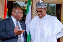 South Africa's President Cyril Ramaphosa speaks to Nigeria's President Muhammadu Buhari at the State House in Abuja, Nigeria, July 11, 2018. PHOTO BY RETUERS/Nigeria Presidency