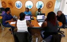 Entrepreneurs work on their projects at Nailab, a Kenyan firm that supports technology startups, behind the latest initiative, which targets entrepreneurs for their ideas on providing sex education through technology and social media in Nairobi, Kenya, July 4, 2016. PHOTO BY REUTERS/Thomas Mukoya
