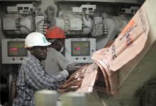 Labourers work at the Dangote Cement factory in Obajana village in Nigeria's central state of Kogi. PHOTO BY REUTERS/Akintunde Akinleye
