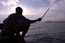 A Congolese fisherman casts his line in Lake Kivu in the eastern city of Goma. PHOTO BY REUTERS/Antony Njuguna